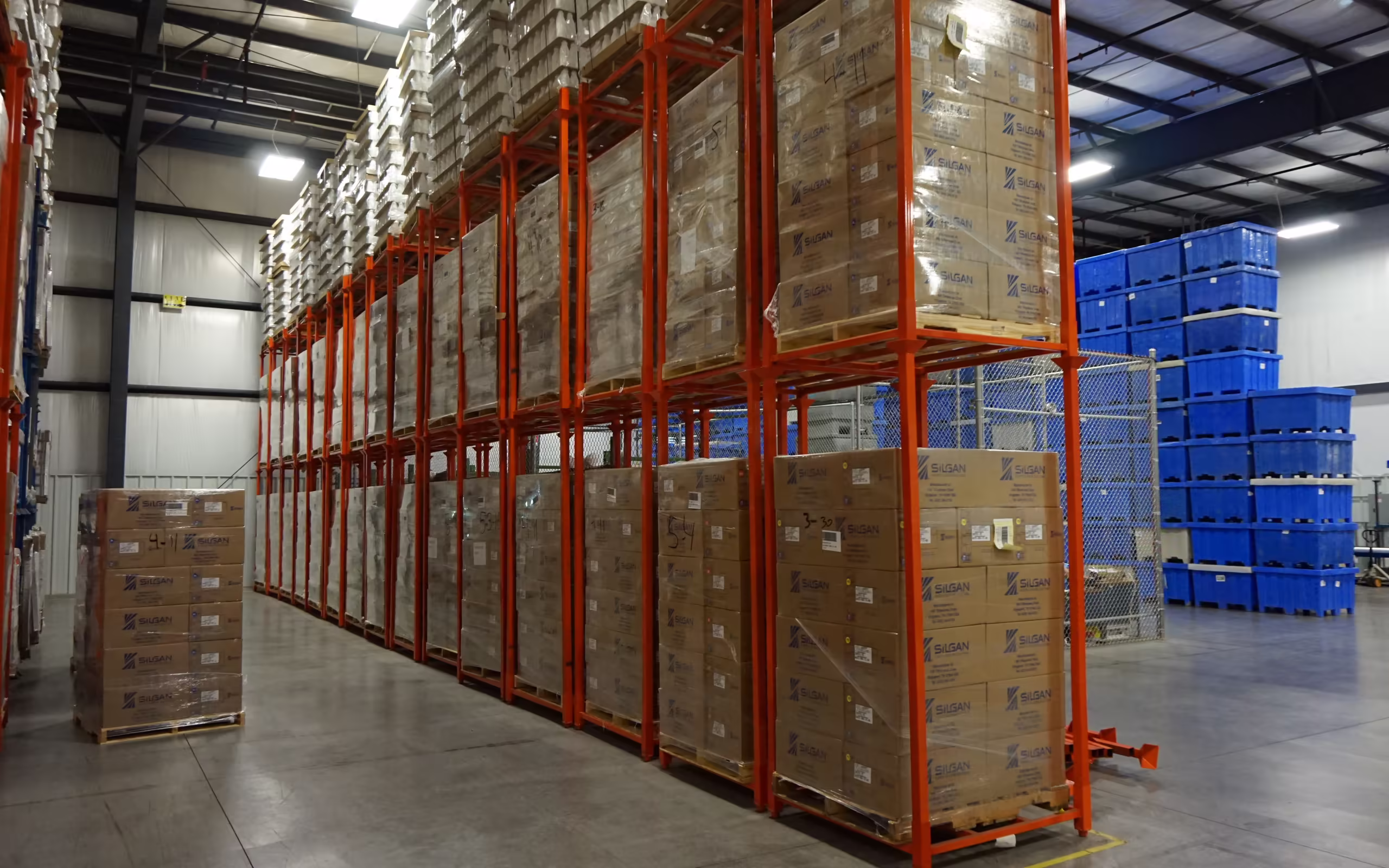 Loaded portable stack racks staged in quantity for high-density storage